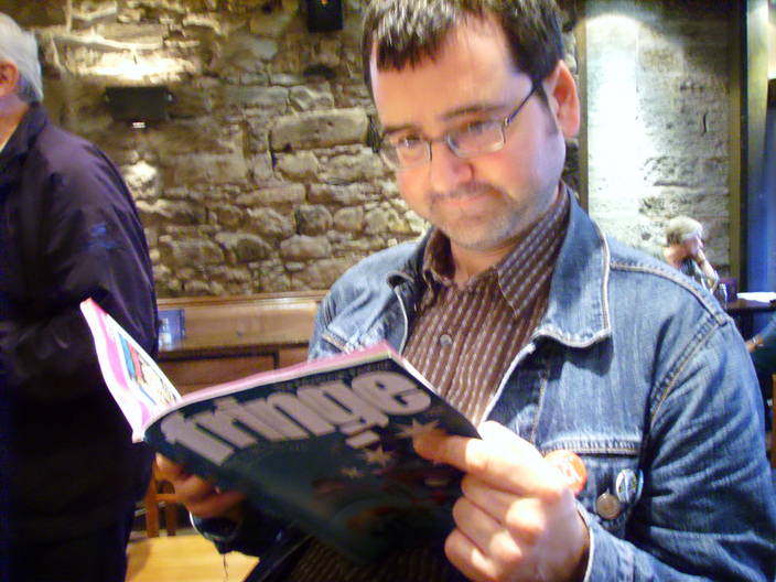 Relaxing in the pub after a tough hour's busking.